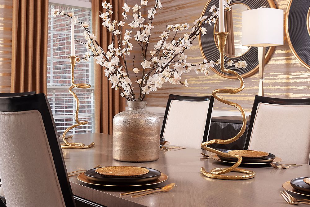 A stunning dining room with shades of autumn. This space shows how layering textiles and other decoration changes a space entirely. 